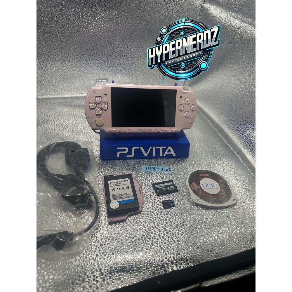 Pink psp 2000 w/ accessories, new battery, no noise!